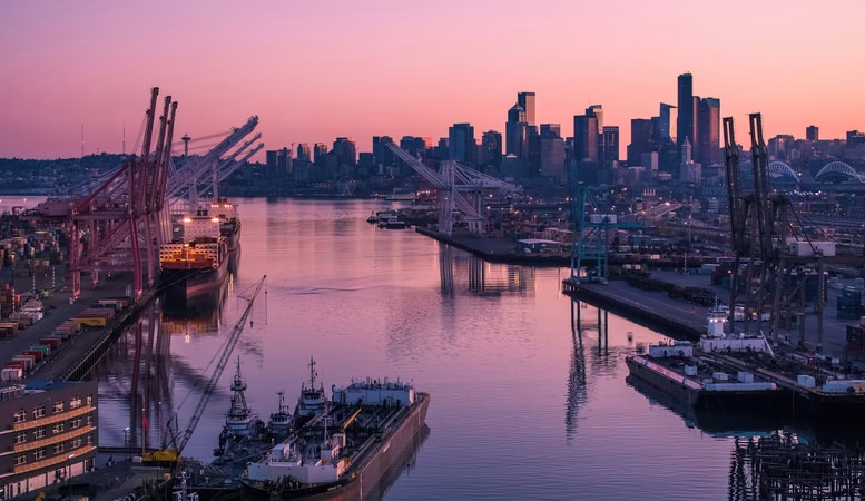 aerial port of seattle waterway at sunrise